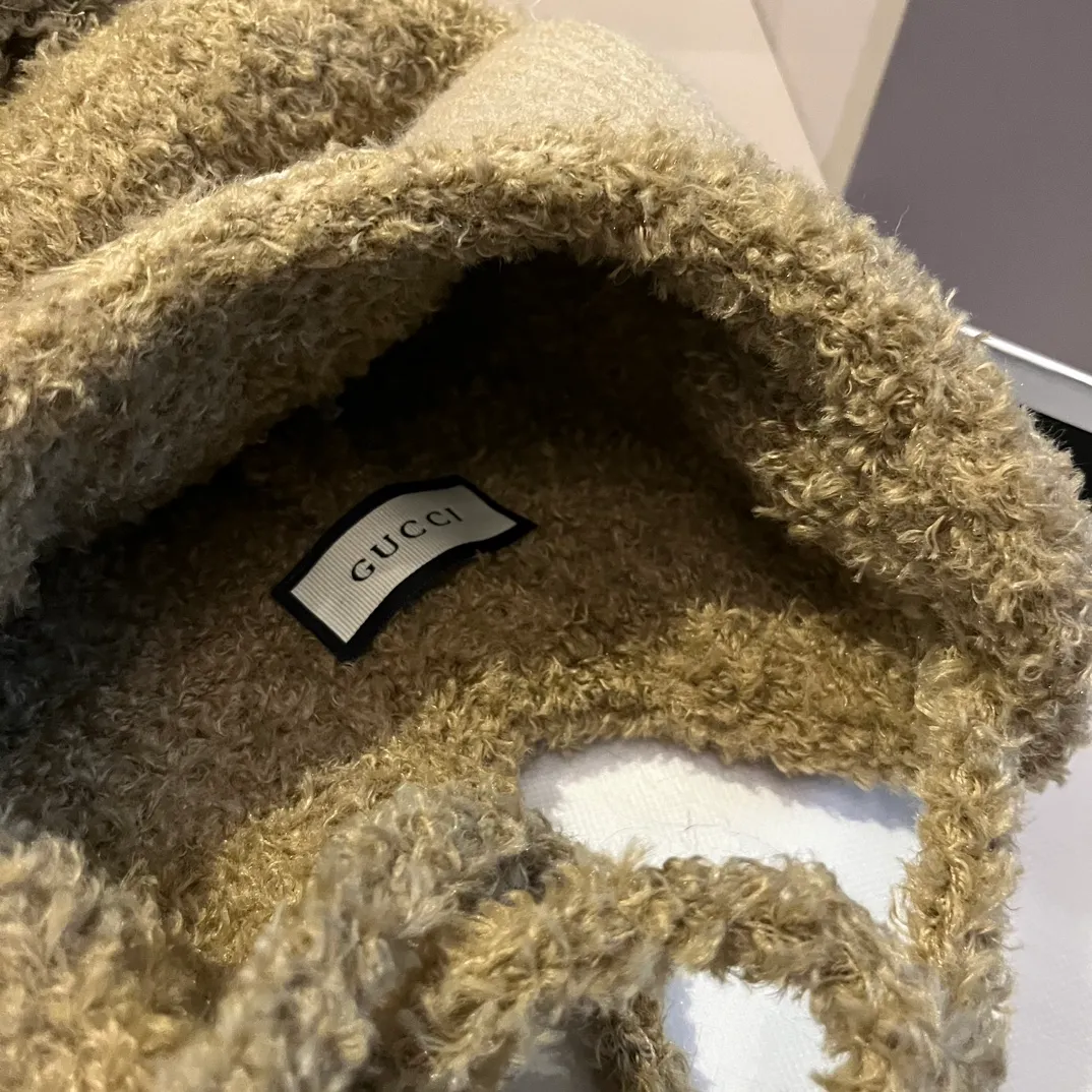 Gucci knitted ear protection beanie