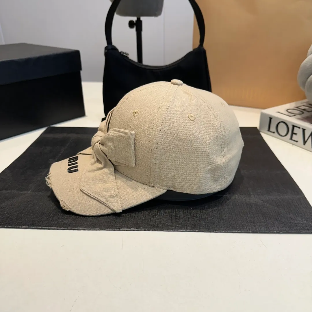 P56 MIUMIU～25 Spring Butterfly New Baseball Cap This hat is so beautiful! The hole design adds a bit of casualness and uninhibitedness, allowing you to easily wear it with casual wear or sportswear.
