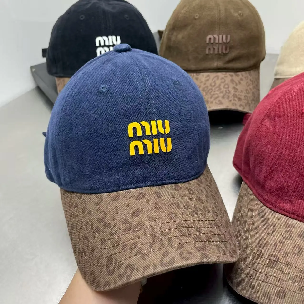 Miumiu autumn and winter leopard print color block baseball cap