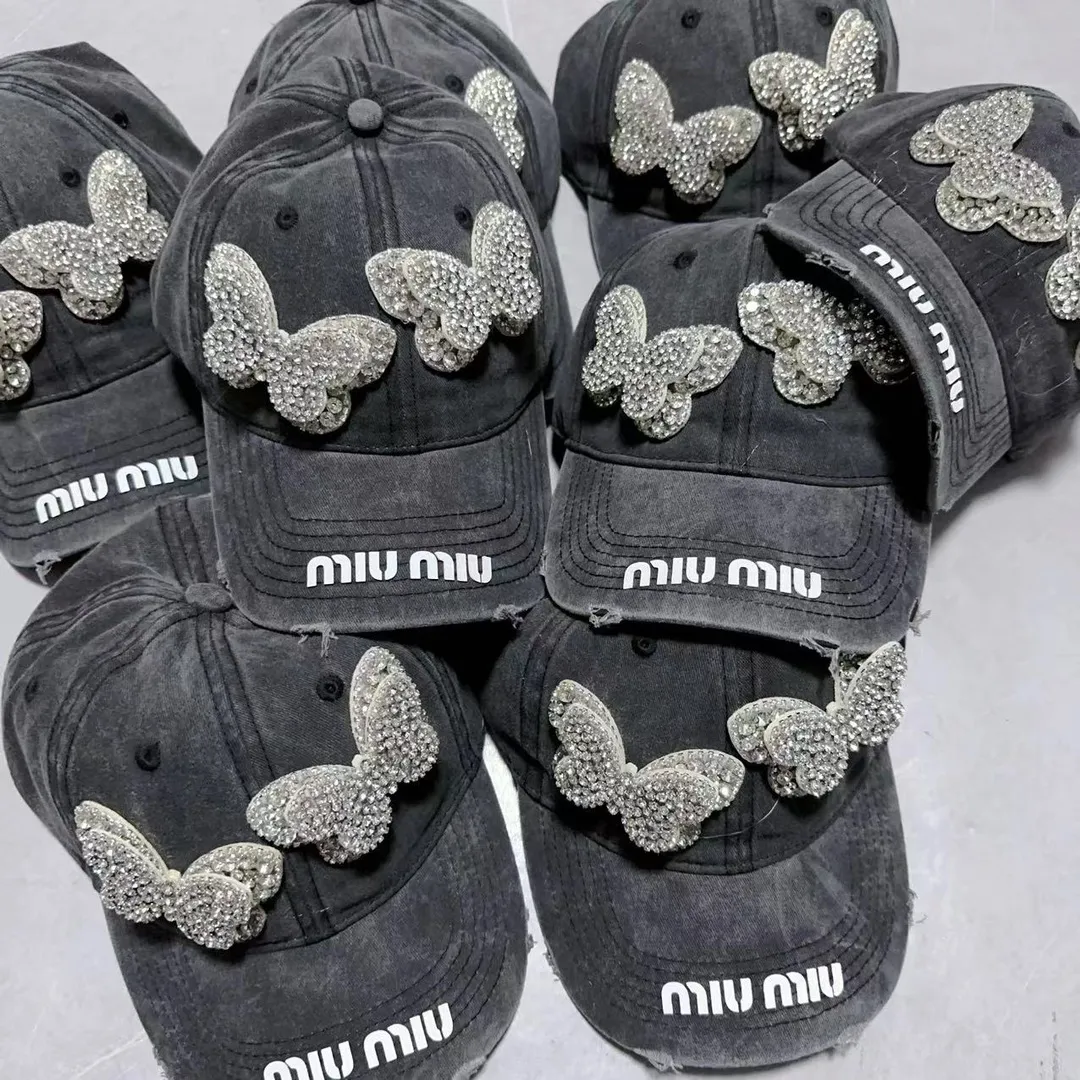 Miumiu Distressed Distressed Butterfly Diamond Baseball Cap