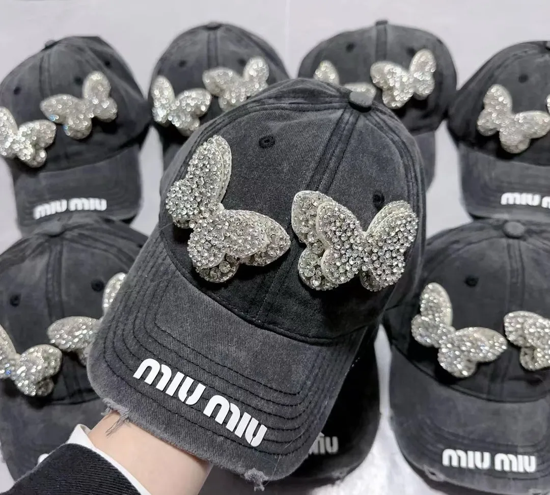 Miumiu Distressed Distressed Butterfly Diamond Baseball Cap