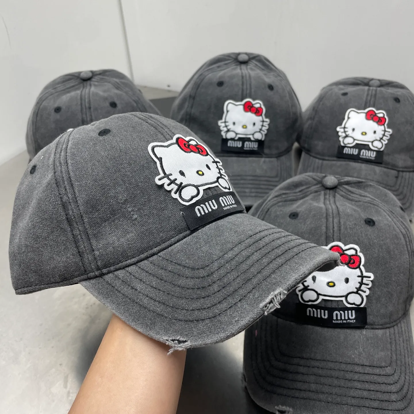kitty Miumiu distressed hole baseball cap