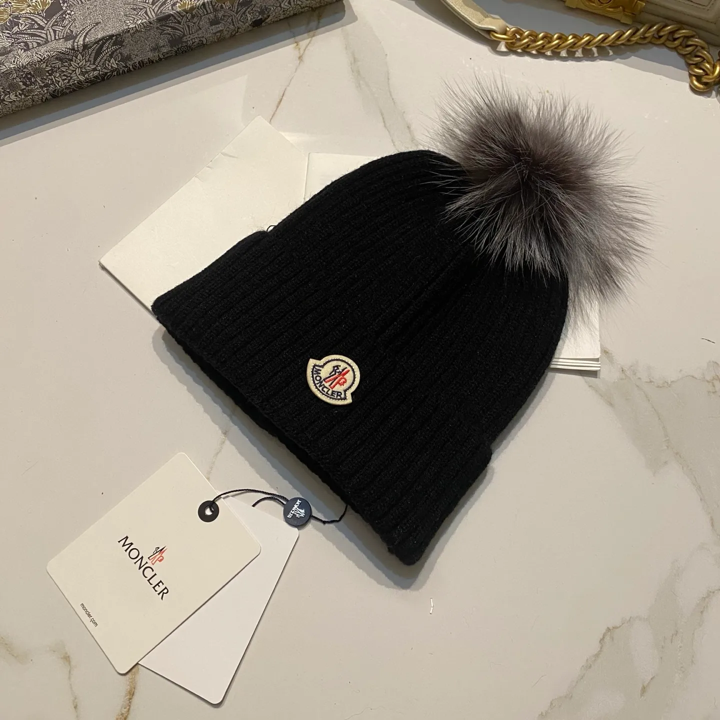 Moncler muzzle knitted hat + black fox fur ball