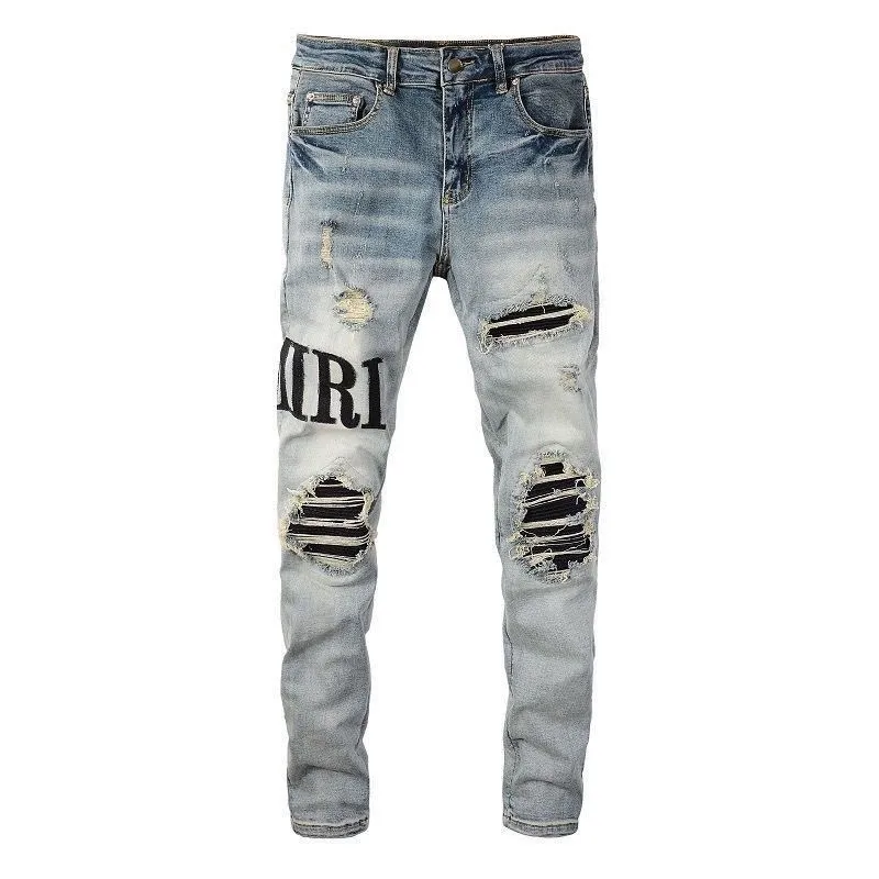 P180 Top replica AMIRI splash-ink medal patch embroidered jeans trousers AMIRI high street basic ripped tight stretch jeans trousers Amiriamiri is transliterated as Emil, which is the name of the founder. Mike Amiri, the founder of amiri, grew up in Los Angeles, USA. He was influenced by the local street culture Rock since he was a child, so he founded the amiri brand named after himself. A variety of trendy brand clothing meets the needs of different fashion players. Amiri clothing has novel and unique styles and is a well-known street brand in the United States. Many of its styles and styles are loved by many street photographers. Various clothing styles meet the needs of different people, show their unique temperament, and show the trend of dressing. amiri's jeans are relatively famous. Not only do they have many styles, but the quality of the jeans is also very good. Many celebrities have also worn amiri brand jeans.  The jeans of the amiri brand break through the production process and cutting of the original jeans. The fabrics are relatively soft and comfortable, and are not as hard as some jeans, which can irritate the skin and cause the skin to bleed when worn. Los Angeles trendy brand Amiri's jeans are made with great detail from tailoring to texture, adding wrinkles, bullet holes, damage and other details to add to the trendiness of the jeans. You can choose the style that suits you according to your own needs. Only when you wear a suitable style can you have a certain sense of fashion.  In recent years, high street has become a word that appears more and more frequently in men's clothing. High street style has also become an important direction for everyone's matching. High street related items are basically inseparable from oversize or off-shoulder tops. The lower body is matched with trackpants or tight-fitting denim. In my opinion, the most representative one is perhaps annihilation. Color; picture color Size: m l xl xxl