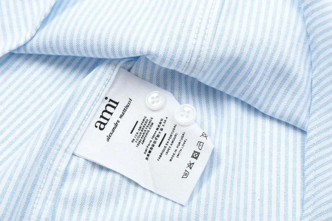 2202# AMI Paris Classic autumn red small heart embroidered on the chest Casual cotton striped long-sleeved Oxford shirt Original custom-made 180g pure cotton fabric Regular version Same style for men and women Colors: Black and white Gray and white Blue and white Green and white Pink and white Size: S-XL
