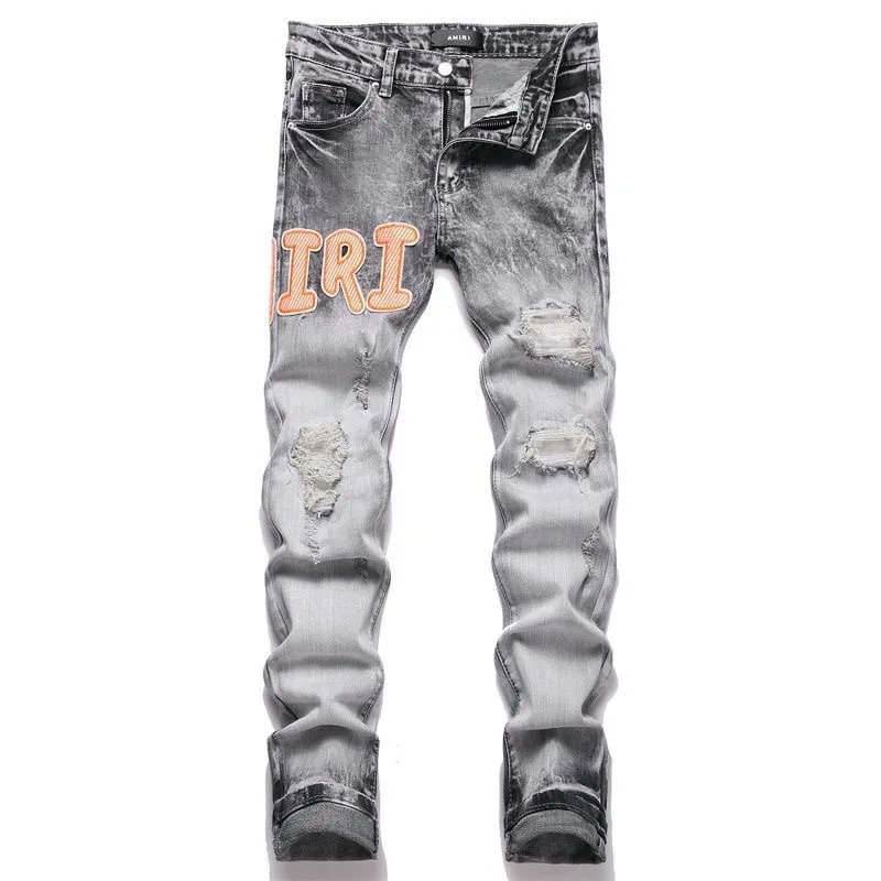 ￼#M17 P168💰 AMIRI patch embroidery jeans trousers AMIRI high street basic ripped tight elastic jeans trousers amiri brand jeans break the production process and cutting of the original jeans, the fabrics are softer and more comfortable Hand-sewn collar label Customized logo buttons Genuine leather tag Color: Picture color Size: 30-32-34-36