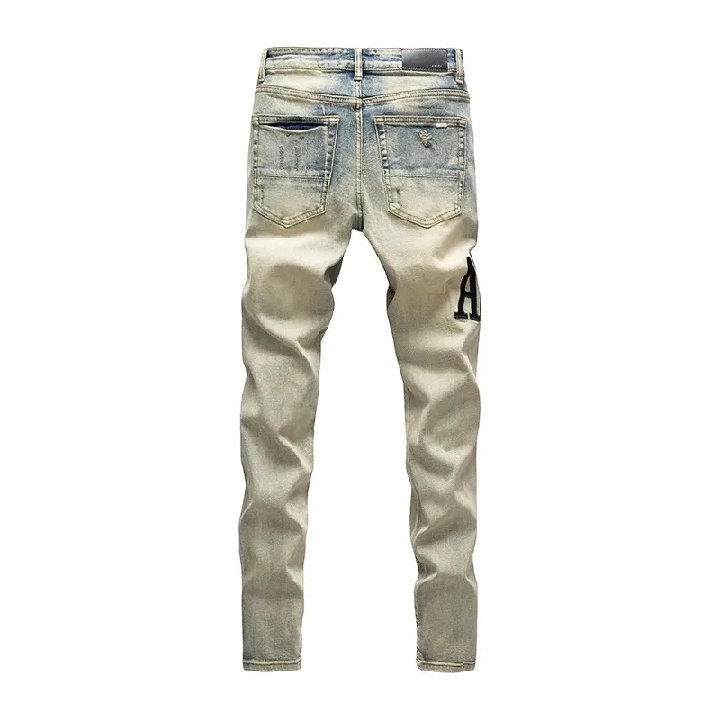 #N11 P246💰 (Top version) AMIRI hot-selling high street jeans, slim-fit stretch washed knife-cut trousers for men, AMIRI amiri is transliterated as Emil, which is the name of the founder. Mike Amiri, the founder of amiri, grew up in Los Angeles, USA. He was influenced by local street culture and Punk Rock since childhood, so he founded the amiri brand named after himself. A variety of trendy clothing meets the needs of different trendy players. Amiri clothing has novel and unique styles and is a well-known street brand in the United States. The styles and styles of many clothes are loved by many street photographers. The various clothing styles meet the dressing needs of different people, show their unique temperament, and show the trend of dressing. amiri's jeans are relatively famous. Not only do they have many styles, but the quality of the jeans is also very good. Many celebrities have also worn amiri brand jeans. Color: Picture color Size: 28, 30, 32, 34, 36 28 30 32 34 36 Waist 71 76 81 86 91 Qianlang 26.5 27.5 28.5 29.5 30.5 Hou Lang 37 38 39 40 41 Foot 14 14.8 15.6 16.4 17.2 Foreign Minister 100 102 104 106 107
