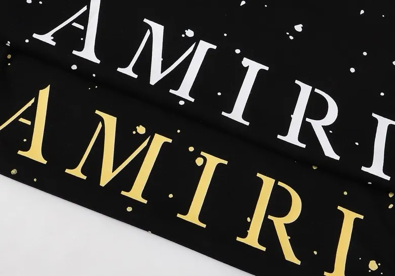 Style number: 671 P126 Fabric: 260g double yarn AMIRI 2025 spring and summer new logo round neck T-shirt high street same style for men and women loose classic letter cashew flower short sleeves Color: black printing white black printing purple code number: S M L XL