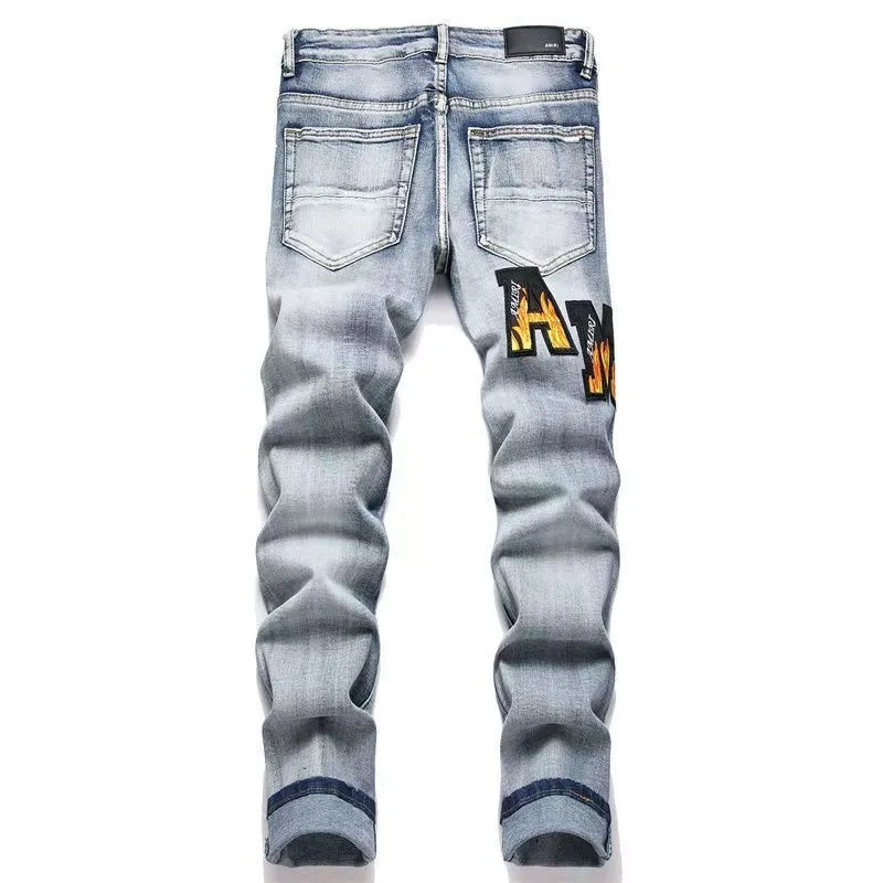 P180 Top replica AMIRI splash-ink medal patch embroidered jeans trousers AMIRI high street basic ripped tight stretch jeans trousers Amiriamiri is transliterated as Emil, which is the name of the founder. Mike Amiri, the founder of amiri, grew up in Los Angeles, USA. He was influenced by the local street culture Rock since he was a child, so he founded the amiri brand named after himself. A variety of trendy brand clothing meets the needs of different fashion players. Amiri clothing has novel and unique styles and is a well-known street brand in the United States. Many of its styles and styles are loved by many street photographers. Various clothing styles meet the needs of different people, show their unique temperament, and show the trend of dressing. amiri's jeans are relatively famous. Not only do they have many styles, but the quality of the jeans is also very good. Many celebrities have also worn amiri brand jeans.  The jeans of the amiri brand break through the production process and cutting of the original jeans. The fabrics are relatively soft and comfortable, and are not as hard as some jeans, which can irritate the skin and cause the skin to bleed when worn. Los Angeles trendy brand Amiri's jeans are made with great detail from tailoring to texture, adding wrinkles, bullet holes, damage and other details to add to the trendiness of the jeans. You can choose the style that suits you according to your own needs. Only when you wear a suitable style can you have a certain sense of fashion.  In recent years, high street has become a word that appears more and more frequently in men's clothing. High street style has also become an important direction for everyone's matching. High street related items are basically inseparable from oversize or off-shoulder tops. The lower body is matched with trackpants or tight-fitting denim. In my opinion, the most representative one is perhaps annihilation. Color; picture color Size: m l xl xxl