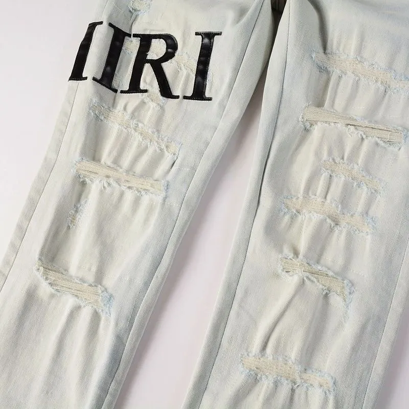 P168 💰 AMIRI patch embroidery jeans trousers AMIRI high street basic ripped tight elastic jeans trousers amiri brand jeans break the production process and cutting of the original jeans, the fabrics are softer and more comfortable Hand-sewn collar label Customized logo buttons Genuine leather tag Color: Picture color Size: 30-32-34-36