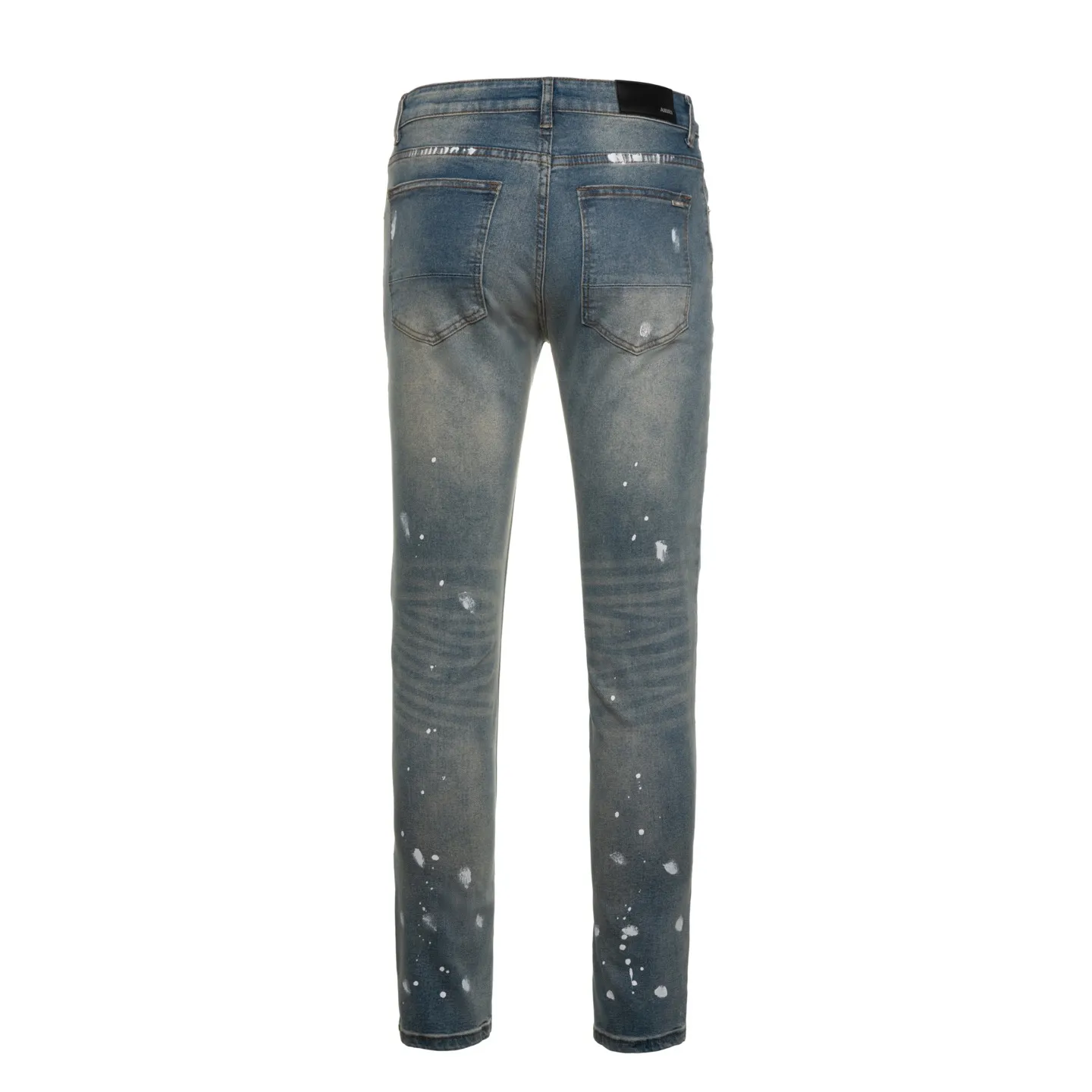 P220 running volume) AMIRI, a trendy brand originating from Los Angeles, was founded by Mike Amiri, who was deeply influenced by street culture and Punk Rock. Its clothing styles are novel and unique, meeting the needs of different fashion players, especially jeans, which are of excellent quality and have been worn by many celebrities. Breaking the traditional production process and cutting, the fabric is soft and skin-friendly, and the details include wrinkles, bullet holes, damage and other designs, making it full of trend. Today I brought you these high street slim jeans with splashes of ink, hot diamonds, white diamonds and washed distressed holes. They are the same style worn by many internet celebrities in Xiaohongshu. Carefully processed by a large washing factory in Ningbo, the front, back, and trouser legs are perfectly faded, giving you a sense of high-end. The destroyed design of the knee part is matched with patchwork leather, which is full of personality. The leather waist nameplate shows the quality, and the custom-made crotch placket hardware is also engraved and molded. The essence of this pair of pants is to destroy the shape and pattern. The master manually frays, cuts and cuts the pants later, which is completely different from the assembly line products. Style number: 1708# Size: 28 (S), 30 (M), 32 (L), 34 (XL)