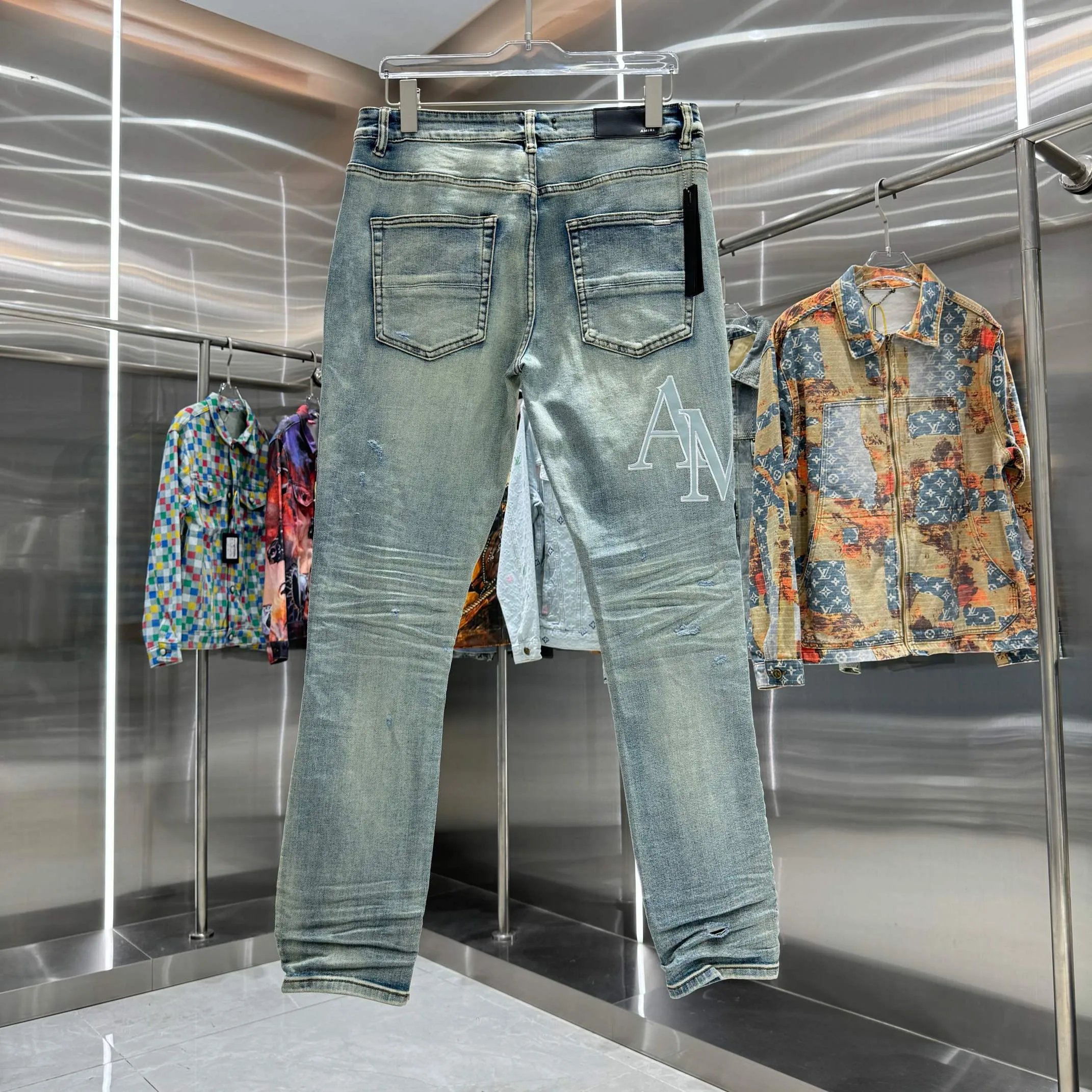 P290 Amiri ripped letter embroidery craft street fashion slim fit stretch jeans color blue size 30 32 34 36 38