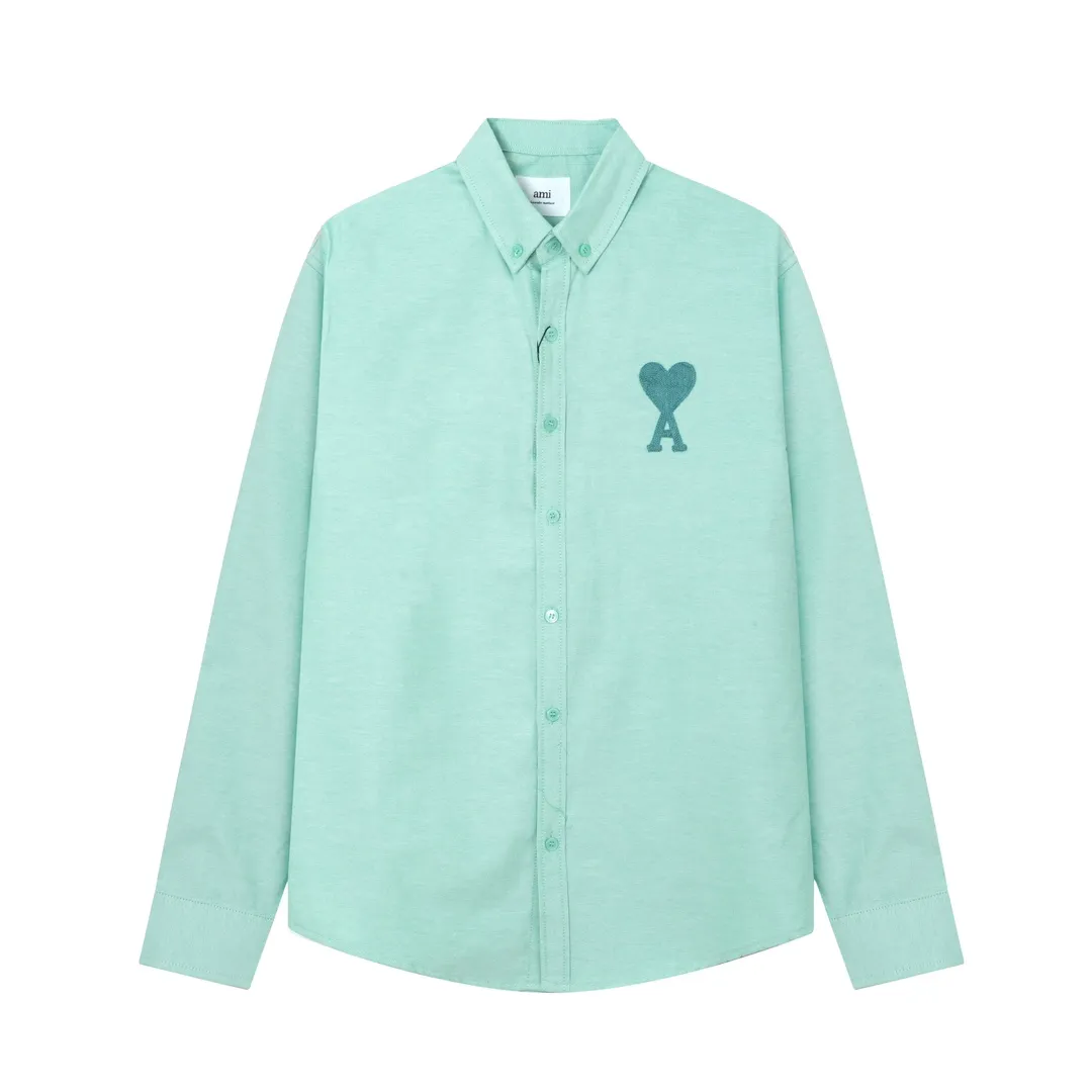 2205# AMI Paris Classic Autumn Towel embroidered with hearts in the same color on the chest Casual cotton solid color long-sleeved Oxford shirt Original customized 180g pure cotton fabric Regular version Same style for men and women Color: White Blue Yellow Aqua Pink Size: S-XL