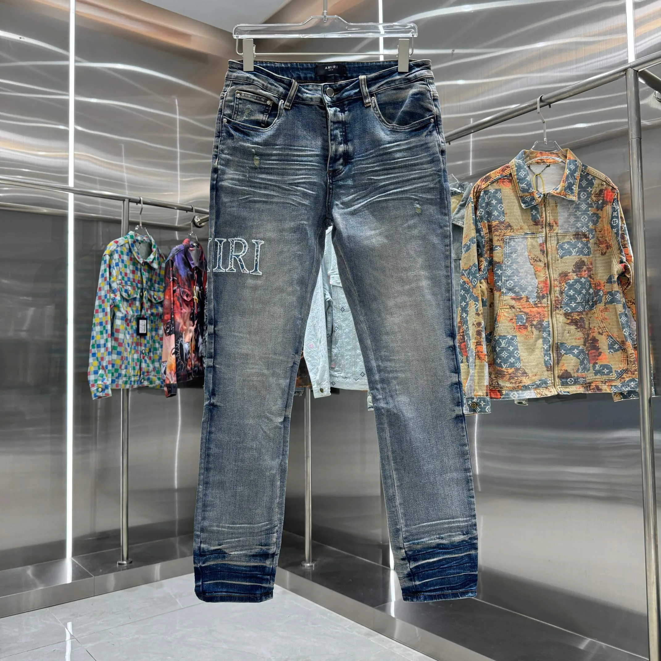 P290 Amiri ripped letter embroidery craft street fashion slim fit stretch jeans color blue size 30 32 34 36 38