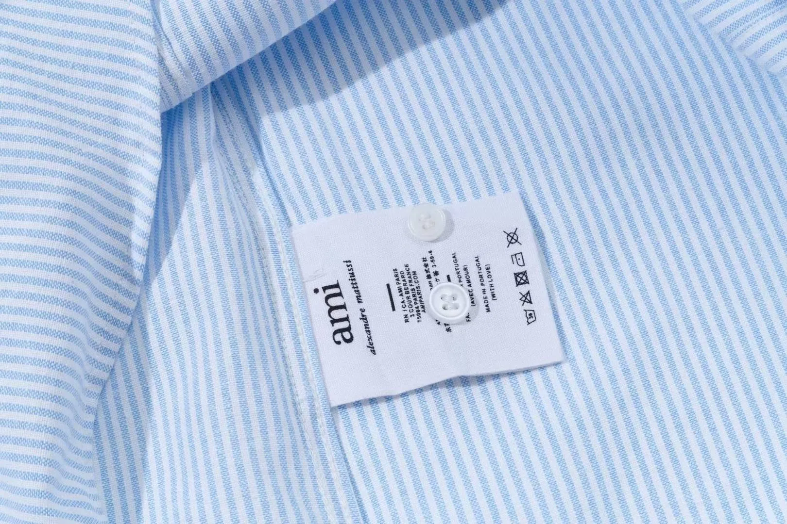 2218# AMI Paris 2025 Autumn and Winter Black classic small love embroidery on the chest Casual cotton striped long-sleeved Oxford shirt Original custom-made 180g pure cotton fabric Regular version Same style for men and women Color: Black and white Blue and white Size: S-XL