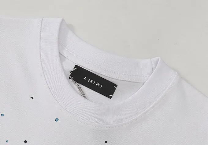 Style number: 657 P126 Fabric: 260g double yarn AMIRI 2025 spring and summer new logo round neck T-shirt high street same style for men and women loose classic ink splashed letter short sleeves Color: black white code number: S M L XL