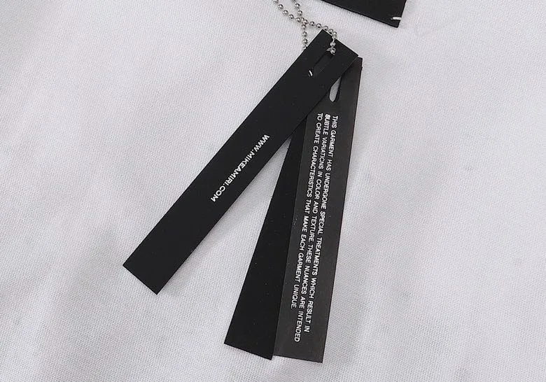 Style number: 657 P126 Fabric: 260g double yarn AMIRI 2025 spring and summer new logo round neck T-shirt high street same style for men and women loose classic ink splashed letter short sleeves Color: black white code number: S M L XL