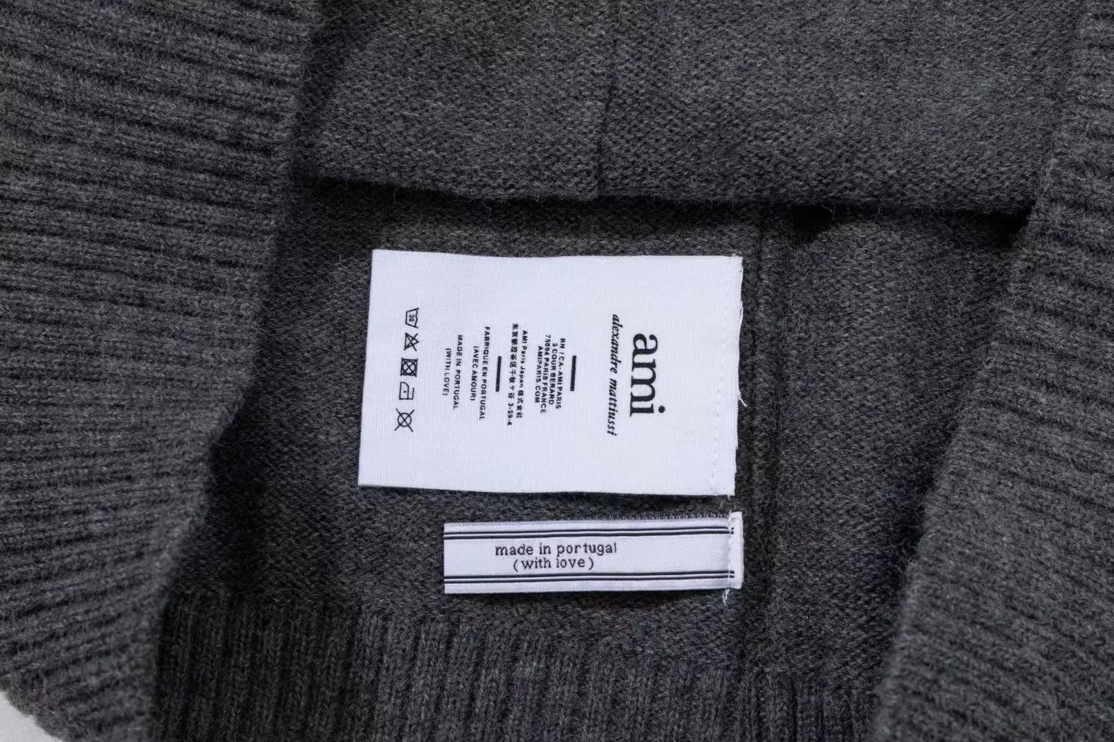 8199# Ami Paris2025 [New arrival in autumn and winter] Black love jacquard ADC Merino Polo collar pullover sweater, the whole body uses reverse bone stitching technology, the same oversize version for men and women, color: white apricot, dark gray, green khaki, size S-XL