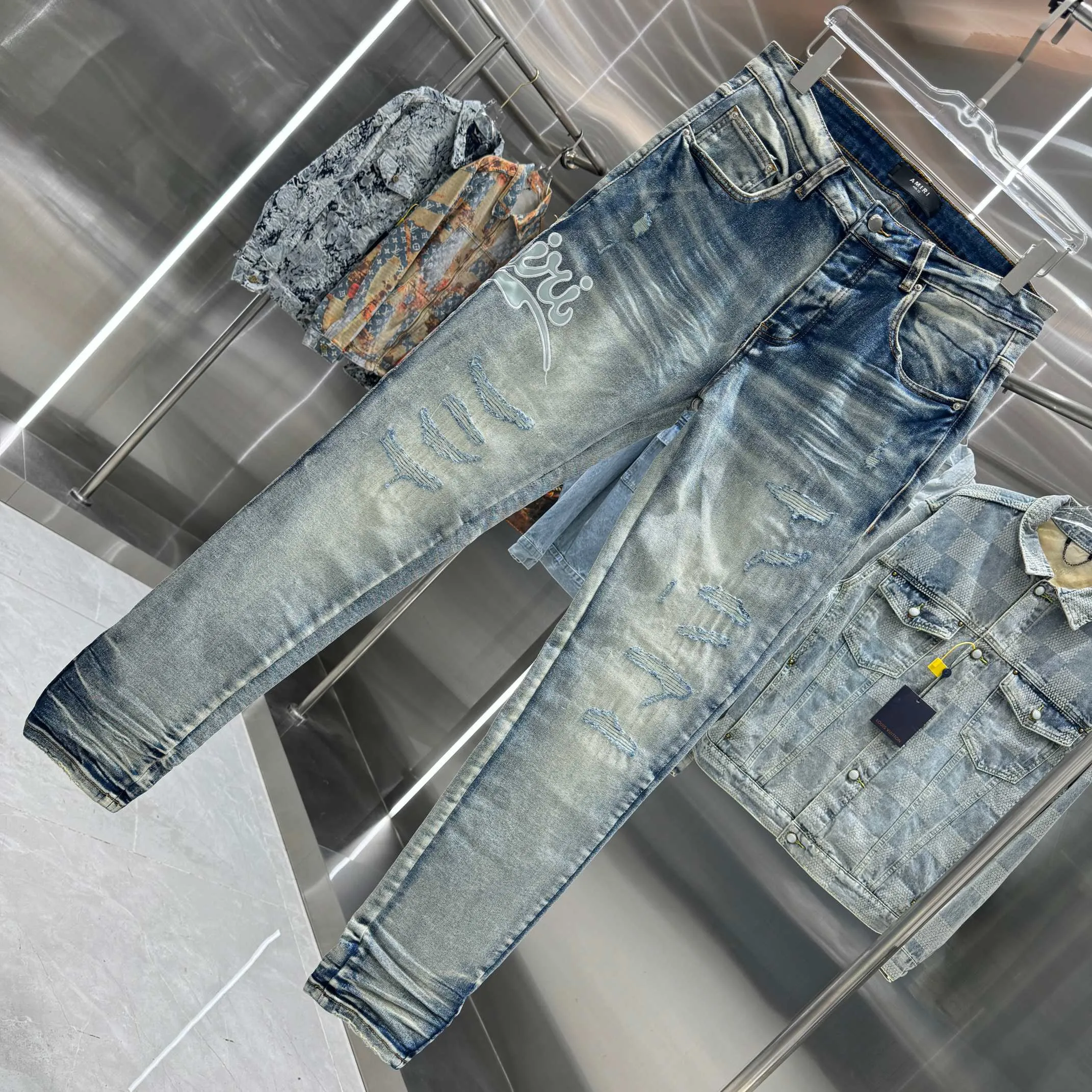 P290 Amiri ripped letter embroidered street fashion slim fit stretch jeans Color light blue Size 30 32 34 36 38