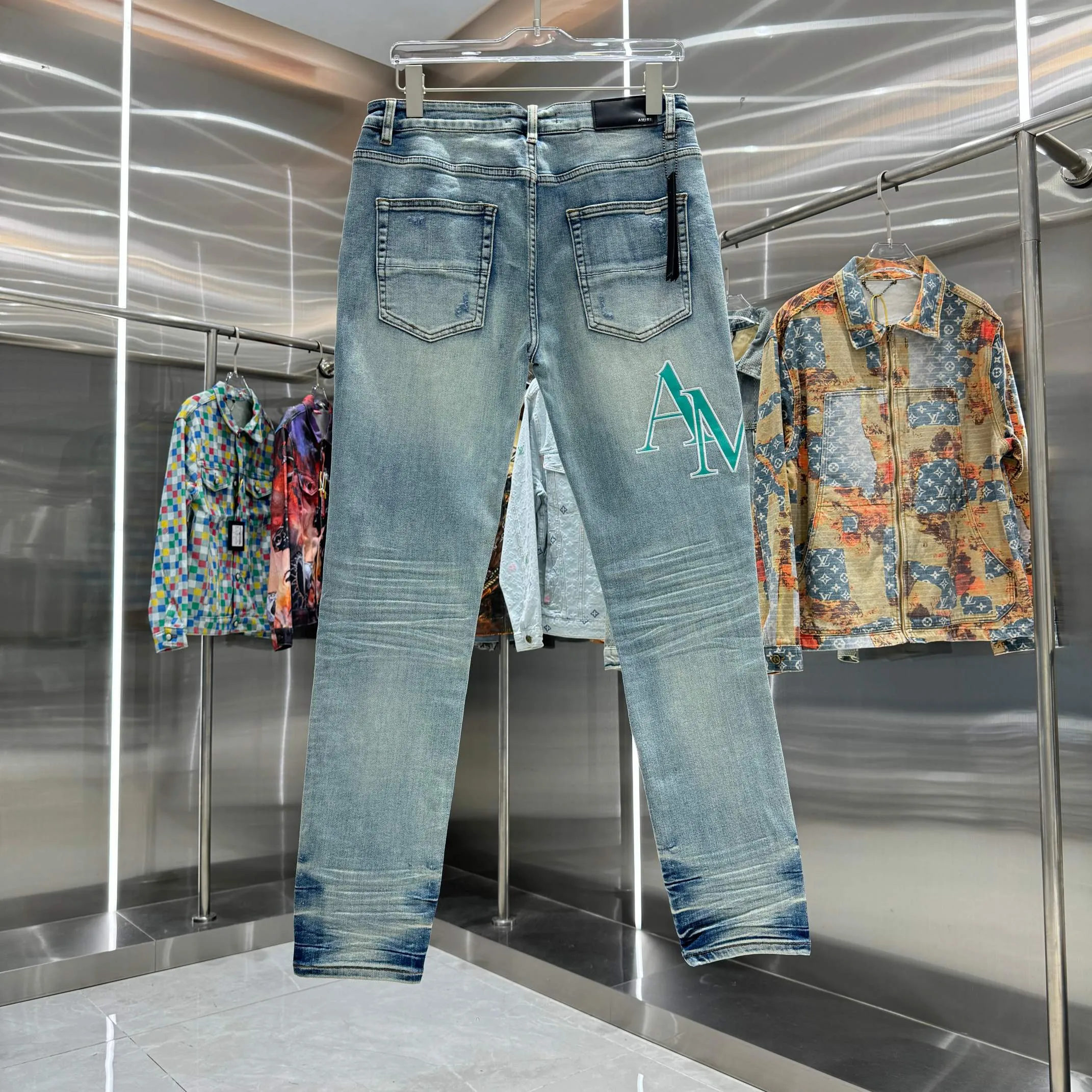 P290 Amiri ripped letter embroidery craft street fashion slim fit stretch jeans color blue size 30 32 34 36 38