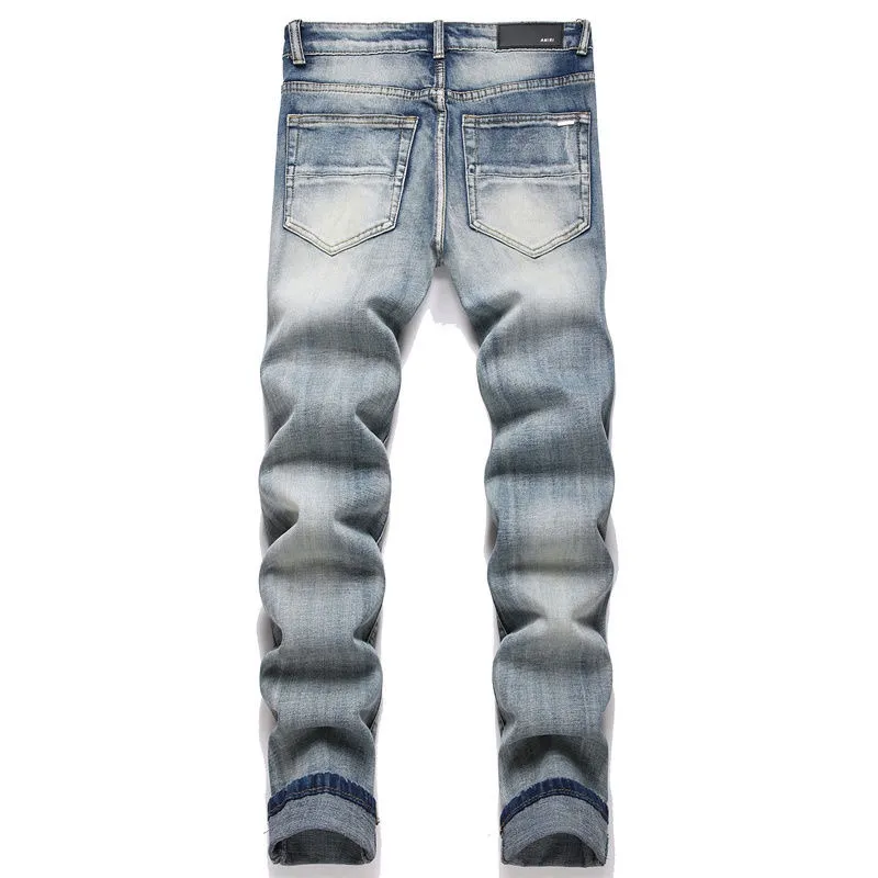 P166 Top replica AMIRI splash-ink medal patch embroidered jeans trousers AMIRI high street basic ripped tight stretch jeans trousers Amiriamiri is transliterated as Emil, which is the name of the founder. Mike Amiri, the founder of amiri, grew up in Los Angeles, USA. He was influenced by the local street culture Rock since childhood, so he founded the amiri brand named after himself. A variety of fashion brand clothing meets the needs of different fashion players. Amiri clothing has novel and unique styles and is a well-known street brand in the United States. Many of its styles and styles are loved by many street photographers. Various clothing styles meet the needs of different people, show their unique temperament, and show the trend of dressing. amiri's jeans are relatively famous. Not only do they have many styles, but the quality of the jeans is also very good. Many celebrities have also worn amiri brand jeans.  The jeans of the amiri brand break through the production process and cutting of the original jeans. The fabrics are relatively soft and comfortable, and are not as hard as some jeans, which can irritate the skin and cause the skin to bleed when worn. Los Angeles trendy brand Amiri's jeans are made with great detail from tailoring to texture, adding wrinkles, bullet holes, damage and other details to add to the trendiness of the jeans. You can choose the style that suits you according to your own needs. Only when you wear a suitable style can you have a certain sense of fashion.  In recent years, high street has become a word that appears more and more frequently in men's clothing. High street style has also become an important direction for everyone's matching. High street related items are basically inseparable from oversize or off-shoulder tops. The lower body is matched with trackpants or tight-fitting denim. In my opinion, the most representative one is perhaps annihilation. Color; picture color Size: m l xl xxl