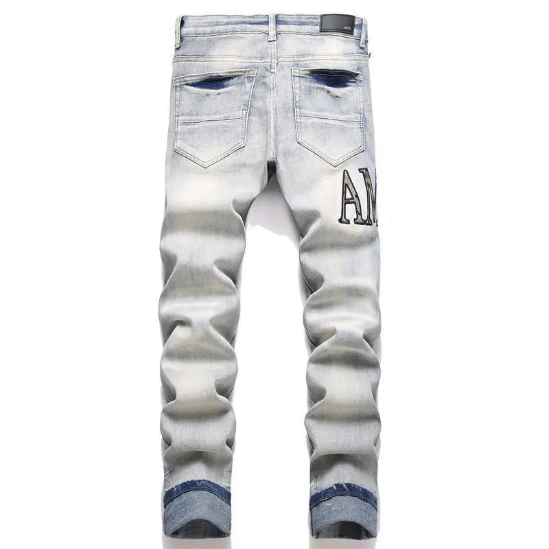 #M48 P168💰 Amiri classic embroidered patched leather distressed lettered jeans, slim fit jeans, produced by a major washed factory, full of high-end feel, partially destroyed knee design with leather patchwork design, has been used as a facade design, leather waist nameplate, the focus of this style is not on the washing, but on the destroyed shape and version. The secret lies in the craftsmanship of the master. The cost of post-processing, grinding, cutting, etc. is far beyond the cost of assembly line products. Color: Picture color Size: 30-32-34-36