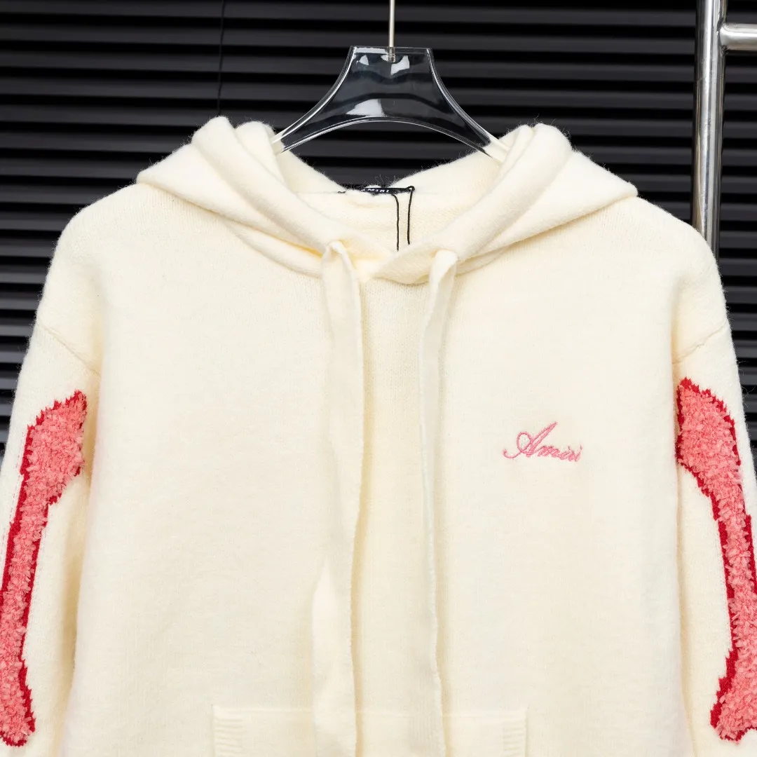 P360 Style: AMIRI Emile bone splicing hooded long-sleeved sweater Size: S-XXL Fabric: Wool blend Accessories: Full set of customized original accessories No gender distinction, same style for men and women
