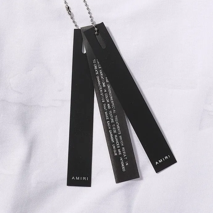 P114 Fabric: 260g double yarn, AMIRI 2025 new spring and summer new logo round neck T-shirt, high street, same style for men and women, loose classic letter foam short sleeves. Color: black. White Size: S M L XL