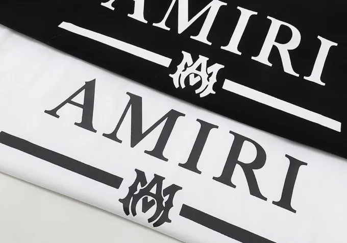Style number: 679 P114 Fabric: 260 grams double yarn AMIRI 2025 spring and summer new logo round neck T-shirt high street men and women loose classic letter short sleeves Color: white black Size: S M L XL