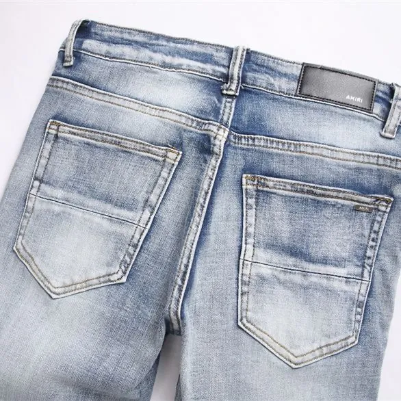 #N03 P186💰 AMIRI patch embroidery jeans trousers AMIRI high street basic ripped tight elastic jeans trousers amiri brand jeans break the production process and cutting of the original jeans, the fabrics are softer and more comfortable Hand-sewn collar label Customized logo buttons Genuine leather tag Color: Picture color Size: 30-32-34-36