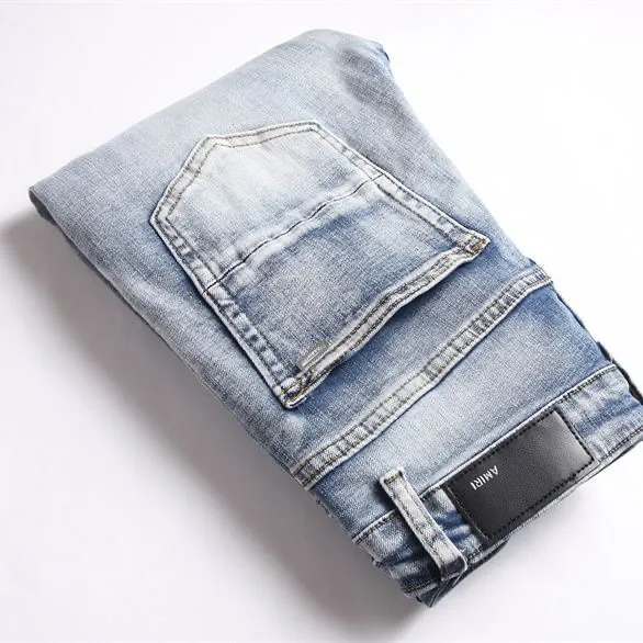 #N03 P186💰 AMIRI patch embroidery jeans trousers AMIRI high street basic ripped tight elastic jeans trousers amiri brand jeans break the production process and cutting of the original jeans, the fabrics are softer and more comfortable Hand-sewn collar label Customized logo buttons Genuine leather tag Color: Picture color Size: 30-32-34-36