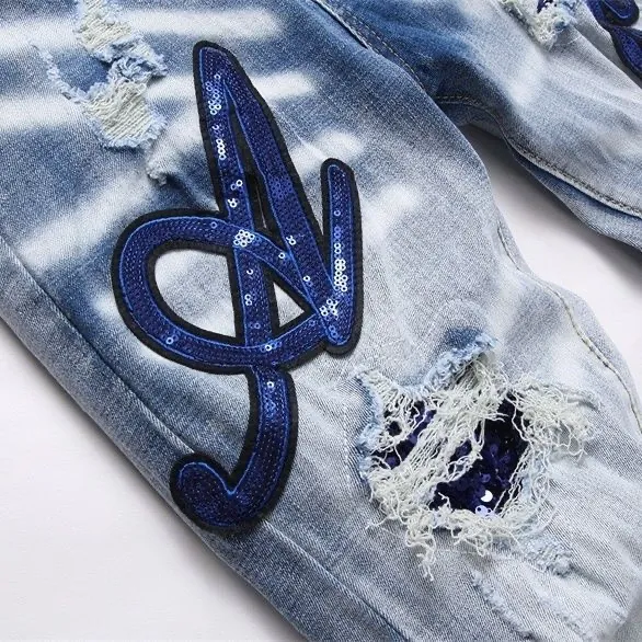 P186 💰 AMIRI patch embroidery jeans trousers AMIRI high street basic ripped tight elastic jeans trousers amiri brand jeans break the production process and cutting of the original jeans, the fabrics are softer and more comfortable Hand-sewn collar label Customized logo buttons Genuine leather tag Color: Picture color Size: 30-32-34-36