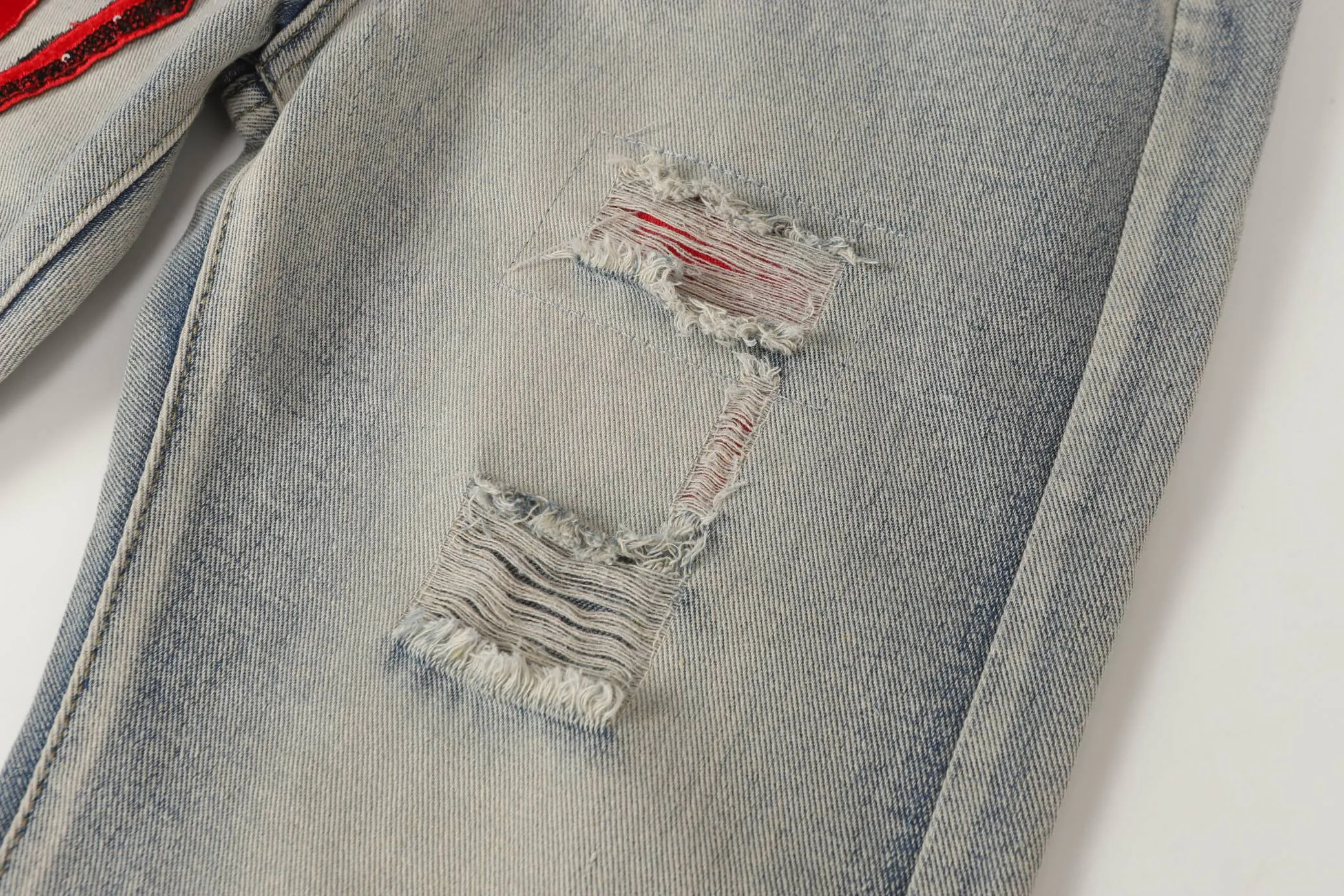 P270 Amiri blood and tears high street ripped embroidered washed jeans Color: Picture color Code number: 28-36