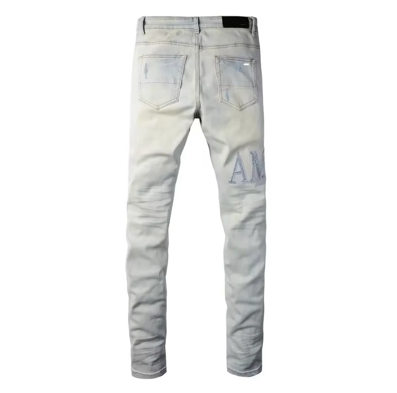 #M01 P168💰 AMIRI white ripped high street jeans with diamonds! The transliteration of amiri is Emil, which is the name of the founder. Mike Amiri, the founder of amiri, grew up in Los Angeles, USA. He was influenced by local street culture and Punk Rock since he was a child, so he founded the amiri brand named after himself. A variety of trendy clothing meets the needs of different fashion players. Amiri clothing has novel and unique styles and is a well-known street brand in the United States. The styles and styles of many clothes are loved by many street photographers. The various clothing styles meet the dressing needs of different people, show their unique temperament, and show the trend of dressing. amiri's jeans are relatively famous. Not only do they have many styles, but the quality of their denim jackets is also very good. Many celebrities have also worn the amiri brand's denim series. The fabric is made of 100% cotton denim! High temperature setting, heavy sand washing, never fade, full of fashion! All made to order! -The colorful embroidery on the chest is so tense and the embroidery is neat! Imported machine for work! quality assurance!  -The entire garment is made with fine workmanship. Each seam is pressed using a double-needle machine. This stitching is a test of the workers' skills. If it goes astray, the entire garment will be scrapped. The hardware is custom-made, with exclusive logos, and is a one-to-one replica of the original! Original trademark! The fit is loose and slimming! Color: Picture color Size: 30-32-34-36