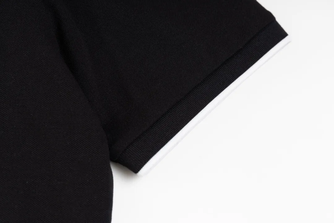 P180 AMIRI/Amiri, the American fashion brand's 2025 spring and summer Polo shirt, the same style is sold at the counter, customized fabrics, excellent texture, contrasting color splicing, ready-made clothes with stylish drapes, comfortable to wear and skin-friendly, heavy workmanship to create the original logo, complete three labels, excellent upper body effect, original purchase, a must-have for men's wardrobe. Color: Black Size: M-3XL