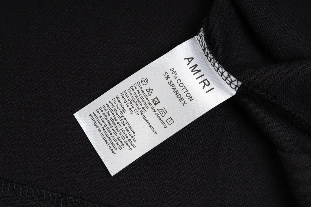 P180 AMIRI/Amiri, the American fashion brand's 2025 spring and summer Polo shirt, the same style is sold at the counter, customized fabrics, excellent texture, contrasting color splicing, ready-made clothes with stylish drapes, comfortable to wear and skin-friendly, heavy workmanship to create the original logo, complete three labels, excellent upper body effect, original purchase, a must-have for men's wardrobe. Color: Black Size: M-3XL