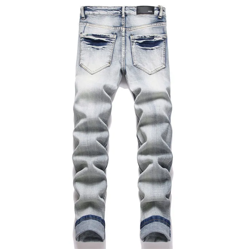 P166 Top replica AMIRI splash-ink medal patch embroidered jeans trousers AMIRI high street basic ripped tight stretch jeans trousers Amiriamiri is transliterated as Emil, which is the name of the founder. Mike Amiri, the founder of amiri, grew up in Los Angeles, USA. He was influenced by the local street culture Rock since childhood, so he founded the amiri brand named after himself. A variety of fashion brand clothing meets the needs of different fashion players. Amiri clothing has novel and unique styles and is a well-known street brand in the United States. Many of its styles and styles are loved by many street photographers. Various clothing styles meet the needs of different people, show their unique temperament, and show the trend of dressing. amiri's jeans are relatively famous. Not only do they have many styles, but the quality of the jeans is also very good. Many celebrities have also worn amiri brand jeans.  The jeans of the amiri brand break through the production process and cutting of the original jeans. The fabrics are relatively soft and comfortable, and are not as hard as some jeans, which can irritate the skin and cause the skin to bleed when worn. Los Angeles trendy brand Amiri's jeans are made with great detail from tailoring to texture, adding wrinkles, bullet holes, damage and other details to add to the trendiness of the jeans. You can choose the style that suits you according to your own needs. Only when you wear a suitable style can you have a certain sense of fashion.  In recent years, high street has become a word that appears more and more frequently in men's clothing. High street style has also become an important direction for everyone's matching. High street related items are basically inseparable from oversize or off-shoulder tops. The lower body is matched with trackpants or tight-fitting denim. In my opinion, the most representative one is perhaps annihilation. Color; picture color Size: m l xl xxl