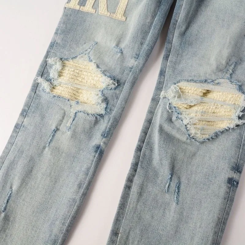 P166 Top replica AMIRI splash-ink medal patch embroidered jeans trousers AMIRI high street basic ripped tight stretch jeans trousers Amiriamiri is transliterated as Emil, which is the name of the founder. Mike Amiri, the founder of amiri, grew up in Los Angeles, USA. He was influenced by the local street culture Rock since childhood, so he founded the amiri brand named after himself. A variety of fashion brand clothing meets the needs of different fashion players. Amiri clothing has novel and unique styles and is a well-known street brand in the United States. Many of its styles and styles are loved by many street photographers. Various clothing styles meet the needs of different people, show their unique temperament, and show the trend of dressing. amiri's jeans are relatively famous. Not only do they have many styles, but the quality of the jeans is also very good. Many celebrities have also worn amiri brand jeans.  The jeans of the amiri brand break through the production process and cutting of the original jeans. The fabrics are relatively soft and comfortable, and are not as hard as some jeans, which can irritate the skin and cause the skin to bleed when worn. Los Angeles trendy brand Amiri's jeans are made with great detail from tailoring to texture, adding wrinkles, bullet holes, damage and other details to add to the trendiness of the jeans. You can choose the style that suits you according to your own needs. Only when you wear a suitable style can you have a certain sense of fashion.  In recent years, high street has become a word that appears more and more frequently in men's clothing. High street style has also become an important direction for everyone's matching. High street related items are basically inseparable from oversize or off-shoulder tops. The lower body is matched with trackpants or tight-fitting denim. In my opinion, the most representative one is perhaps annihilation. Color; picture color Size: m l xl xxl