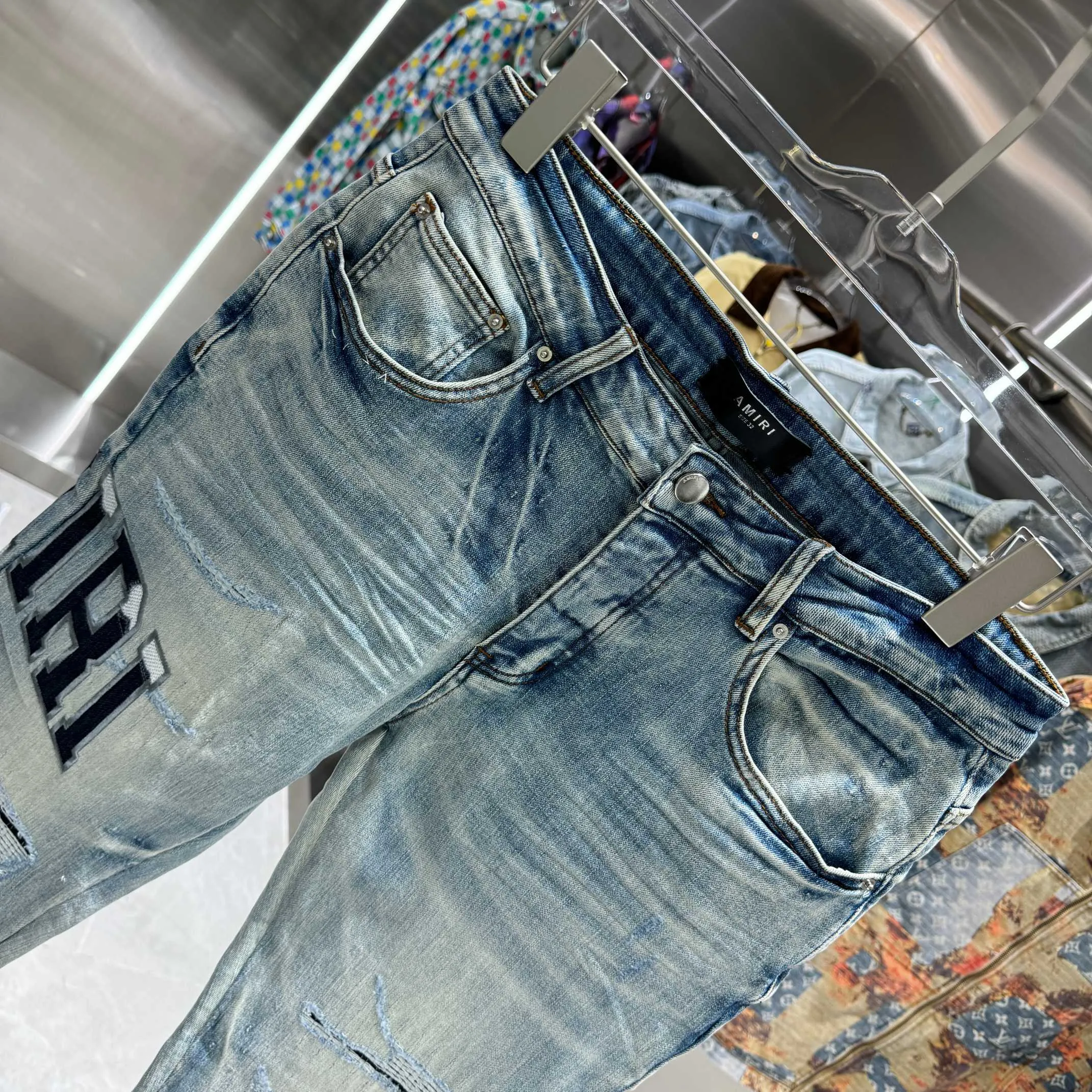 P290 Amiri ripped letter embroidery craft street fashion slim fit stretch jeans color blue size 30 32 34 36 38