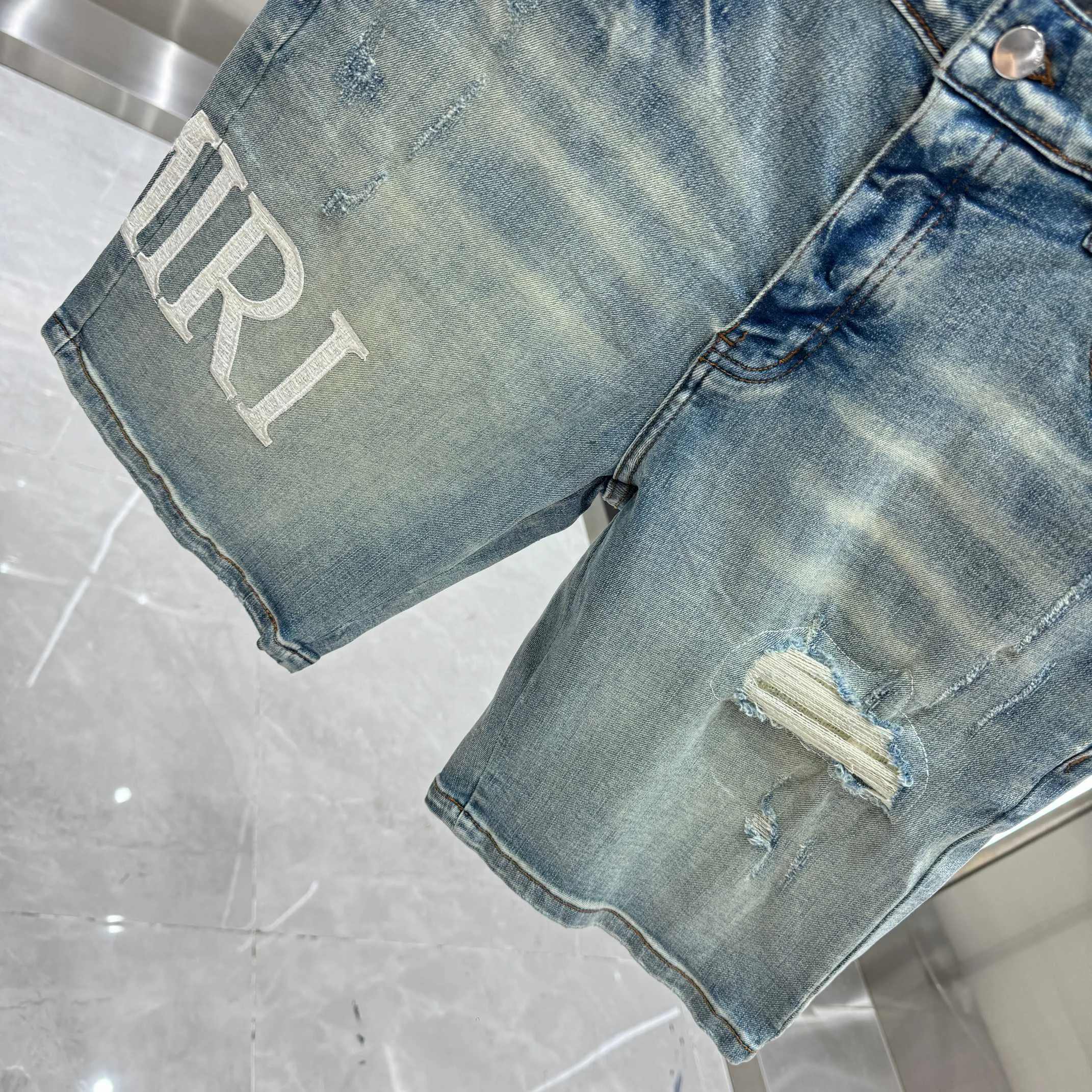 P250 Amiri ripped letter embroidery craft street fashion jeans shorts color blue size 30 32 34 36 38