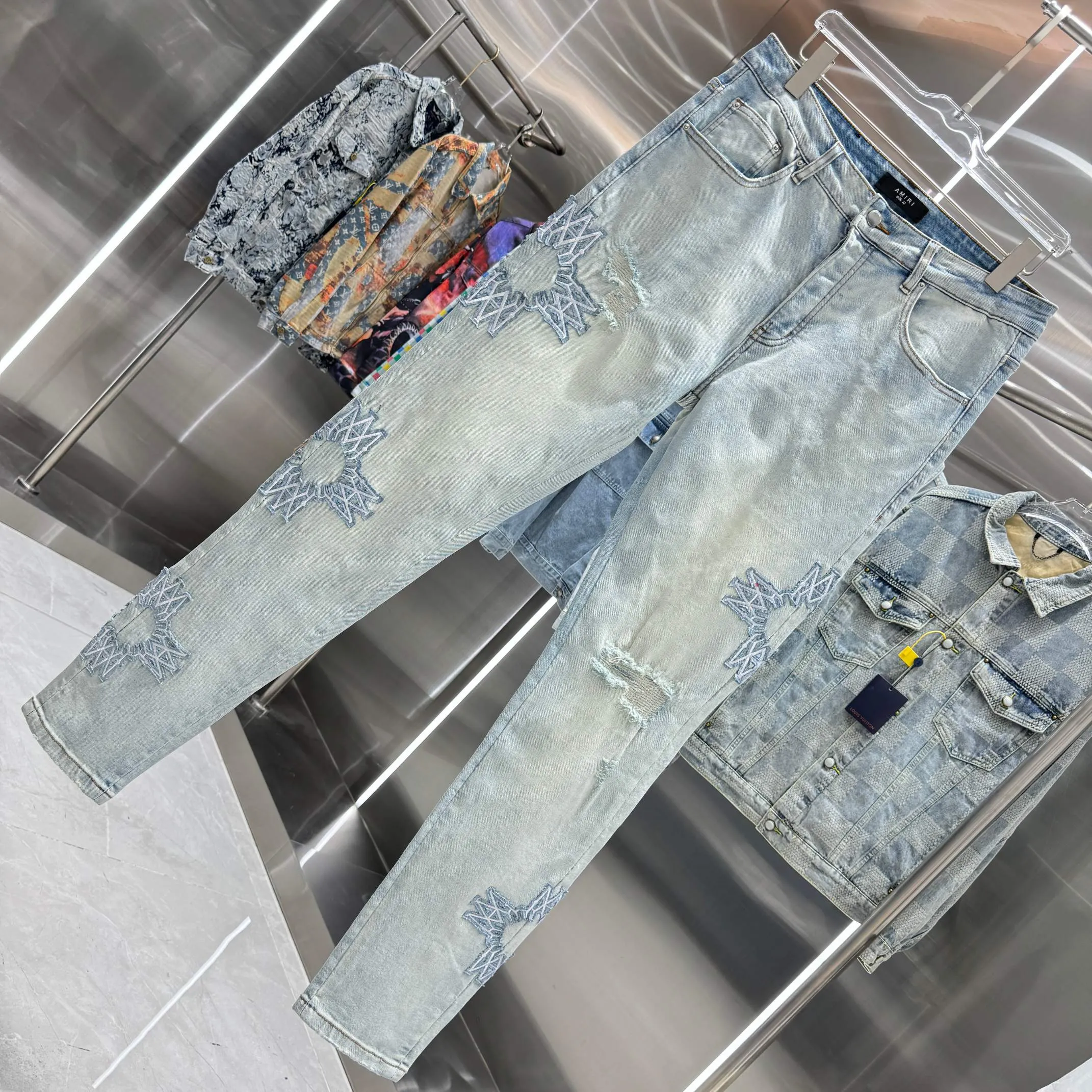 P290 Amiri ripped pattern embroidered street fashion slim fit stretch jeans Color light blue Size 30 32 34 36 38