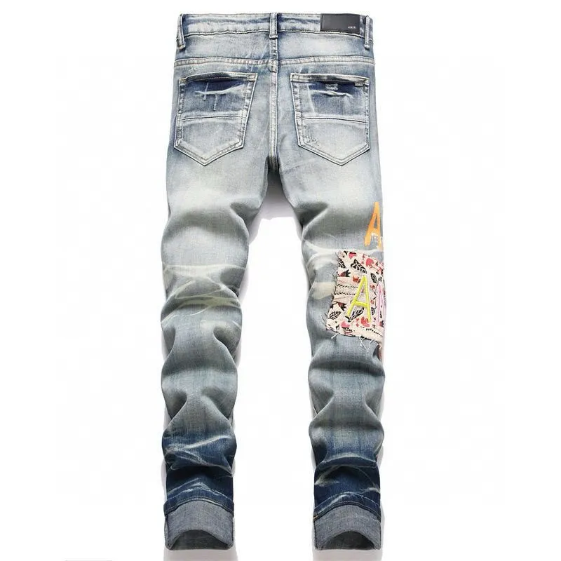 ￼ #M46 P168💰 Amiri’s classic embroidered leather ripped letter jeans. Slim fit jeans. Produced by a major washed factory. Full of high-end. Partial damage to the knees and patchwork design. Already used as a facade design. Leather waist nameplate. The focus of this style is not on the washing, but on the shape and version of the damage. The secret lies in the craftsmanship of the master. The cost of post-processing, grinding, cutting, etc. is far beyond the cost of assembly line products. Color: Picture color Size: 30-32-34-36