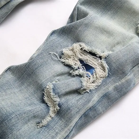 ￼ #M46 P168💰 Amiri’s classic embroidered leather ripped letter jeans. Slim fit jeans. Produced by a major washed factory. Full of high-end. Partial damage to the knees and patchwork design. Already used as a facade design. Leather waist nameplate. The focus of this style is not on the washing, but on the shape and version of the damage. The secret lies in the craftsmanship of the master. The cost of post-processing, grinding, cutting, etc. is far beyond the cost of assembly line products. Color: Picture color Size: 30-32-34-36