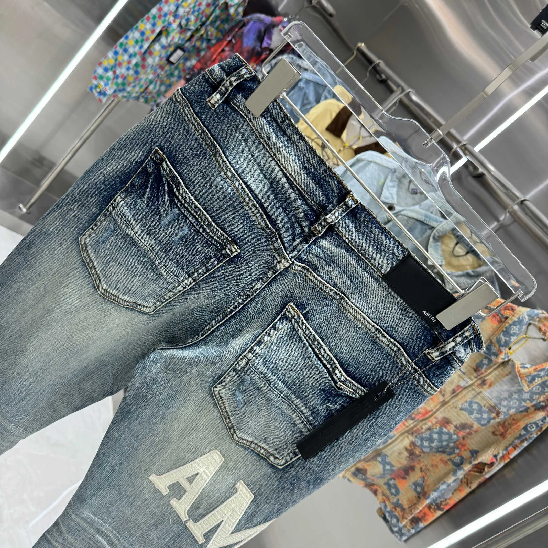 P290 Amiri ripped leather letter embroidery craft street fashion slim fit stretch jeans color blue size 30 32 34 36 38