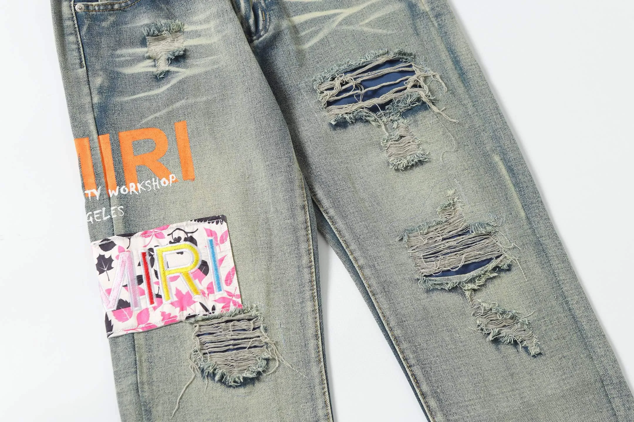 P270 AMIRI patch embroidery jeans trousers AMIRI high street basic ripped jeans trousers Color: Picture color Code number: 28-36