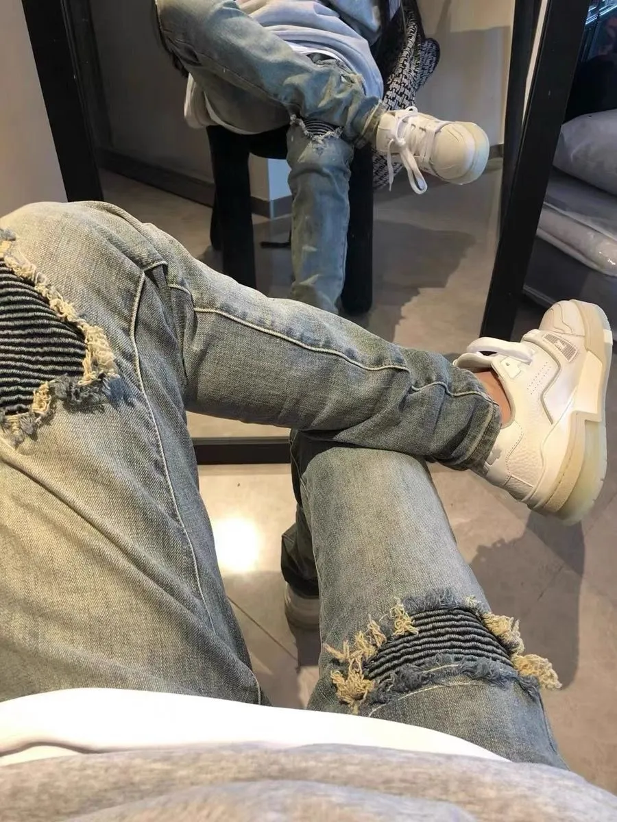 P180 amiri high street ripped patch jeans trousers amiri ripped tight stretch denim trousers amiri hot diamonds amiri is transliterated as Emil, which is the name of the founder. mikeamiri, the founder of amiri, grew up in Los Angeles, USA. He was influenced by the local street culture RO since he was a child, so he founded the amiri brand named after himself. A variety of trendy brand clothing meets the needs of different fashion players. Amiri clothing has novel and unique styles and is a well-known street brand in the United States. The styles and styles of many clothes are loved by many street photographers. The various clothing styles meet the dressing needs of different people, show their unique temperament, and show the trend of dressing. amiri's jeans are relatively famous. Not only do they have many styles, but the quality of the jeans is also very good. Many celebrities have also worn amiri brand jeans. Size: M-XXL