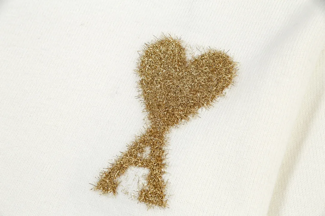 P190 A8149# [Christmas Capsule Series] AMI Paris 2024 new autumn and winter silver big heart alpaca blended soft and waxy knitted turtleneck sweater Oversize version for men and women Color: beige silver heart beige gold heart Size: S-XL