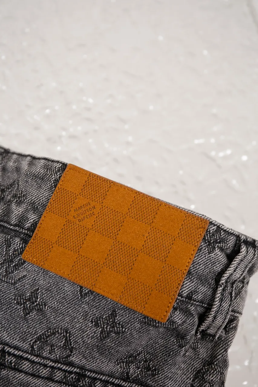 LV MONOGRAM Jacquard Skateboard Jeans These skateboard jeans feature an all-over contrasting Monogram pattern embellished with pearlescent buttons and rivets, giving the casual silhouette a dandy feel. Wear it with the matching denim jacket for a trendy look.  Regular fit Allover Monogram jacquard Damier nubuck label Pockets Pearlescent buttons and rivets 100% cotton