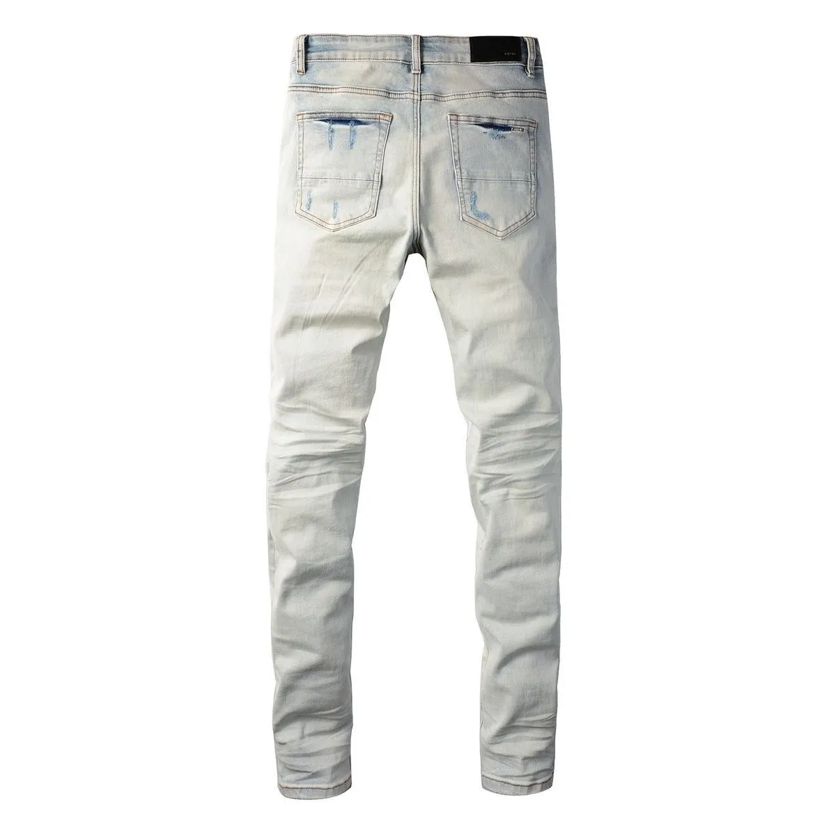 ￼#M16 P168💰 AMIRI patch embroidery jeans trousers AMIRI high street basic ripped tight elastic jeans trousers amiri brand jeans break the production process and cutting of the original jeans, the fabrics are softer and more comfortable Hand-sewn collar label Customized logo buttons Genuine leather tag Color: Picture color Size: 30-32-34-36