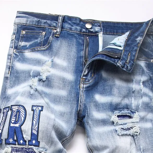P168 💰 AMIRI patch embroidery jeans trousers AMIRI high street basic ripped tight elastic jeans trousers amiri brand jeans break the production process and cutting of the original jeans, the fabrics are softer and more comfortable Hand-sewn collar label Customized logo buttons Genuine leather tag Color: Picture color Size: 30-32-34-36